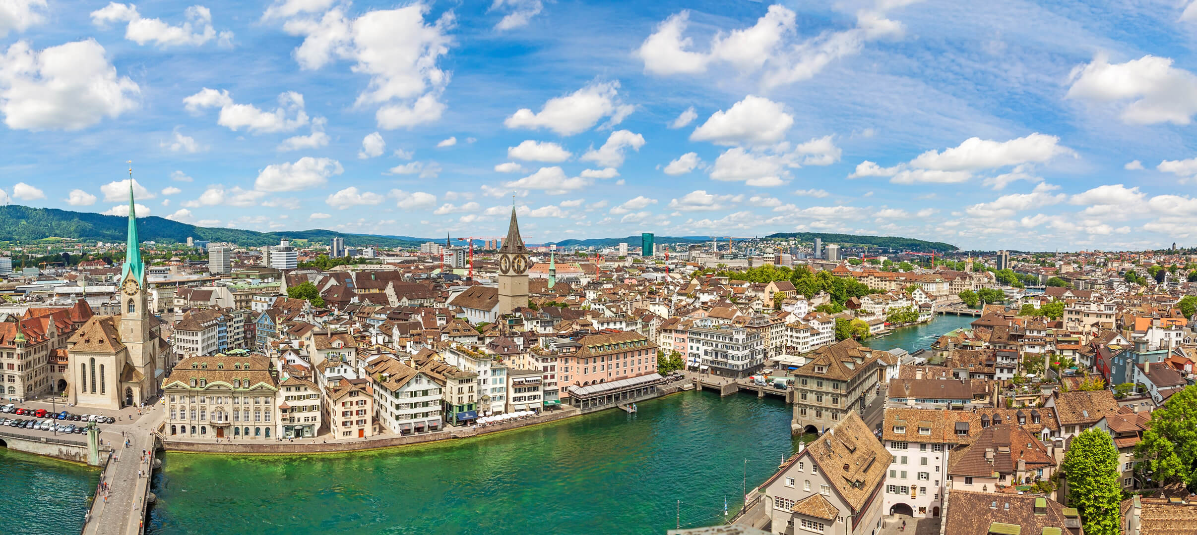 Fraumunster and St. Peter Church - River Limmat in Zurich